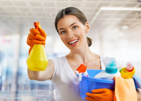 Professional carpet cleaning with safety awareness in a home setting