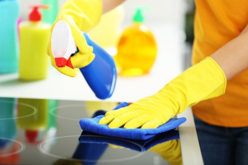 Insured carpet cleaning team working safely in a commercial property